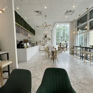 iPhone 12 Pro - 0.5 magnifier camera view.  POV: World Wall Seating - Majority view of restaurant.