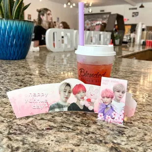 When you buy a drink you get a free cup sleeve and a photo card!