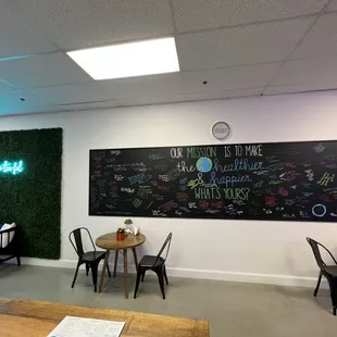 Add to our Purpose wall or take a selfie with our neon sign!