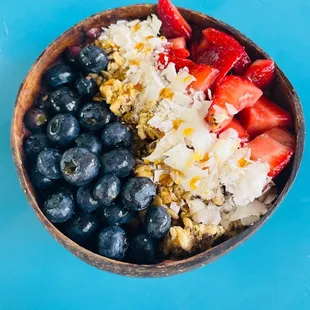 a bowl of fruit and rice