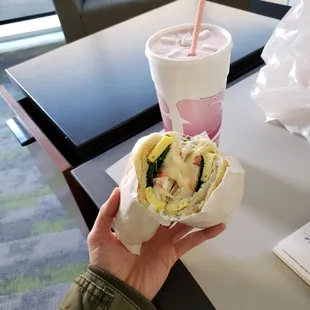 Strawberry banana smoothie and garden veggie breakfast sandwich. Delicious.