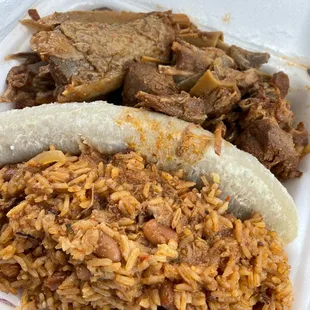 a plate of rice and meat