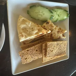 The vehicles to get the dips in your mouth. Crostini, pita, cucumber.