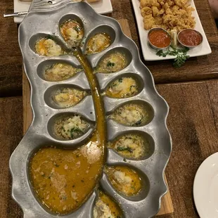 Charbroiled oysters with garlic bread, calamari