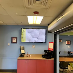 a flat screen tv in the corner