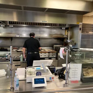 a man working in a kitchen