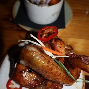 a plate of chicken wings