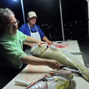 Cleaning  a Golden  Tilefish caught on Aug 30