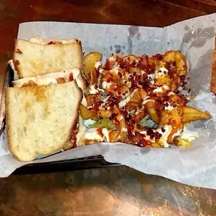 Chicken bacon ranch sandwich with buffalo fries