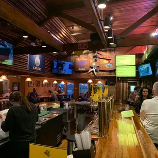 people sitting at the bar