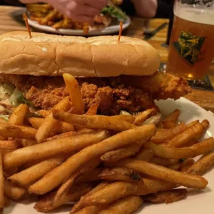 Catfish Po' Boy Lenten Special with seasoned fries.
