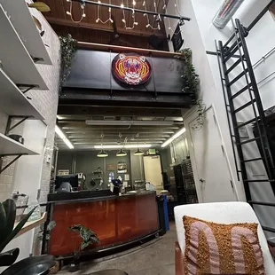 Front counter and their neon sign.