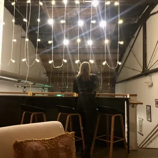 Upstairs lights and furniture are a vibe