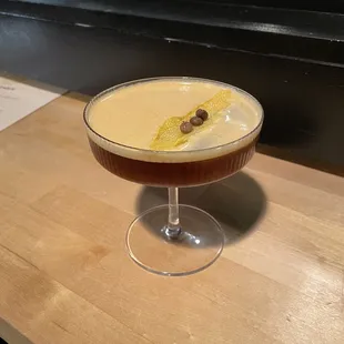 a cocktail in a coupe glass