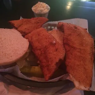 Huge fish sandwich and excellent service at the bar.