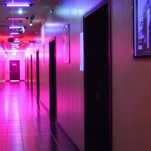 a hallway with neon lights