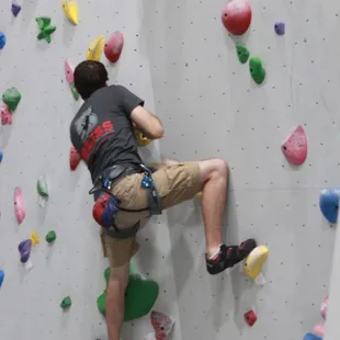 Sporting Bliss while climbing in our 16ft Bouldering Room!