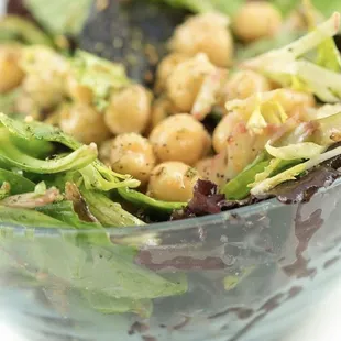 a salad with chickpeas and lettuce