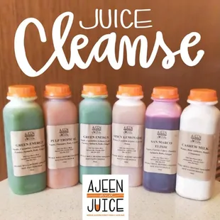 a variety of juice cleanse bottles