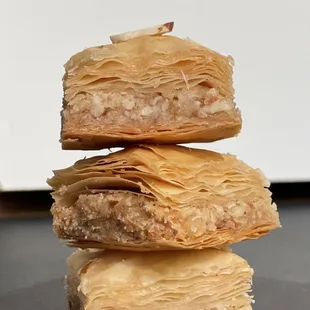 a stack of three pastries