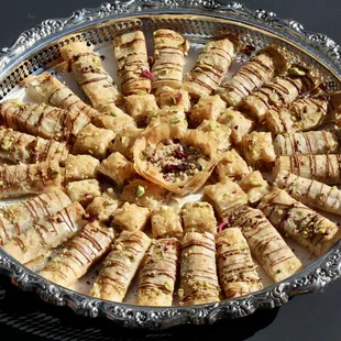 a platter of cookies and pastries