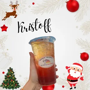 a hand holding a cup of tea