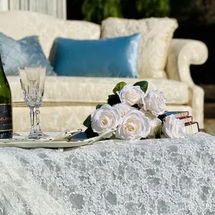 Our Elizabeth loveseat paired with our basic black trunk and vintage blue/gray rug.  Photo courtesy of Jen Samuelson Photography