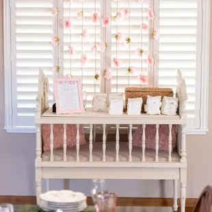 Our vintage Aveline crib used here as a "late night diaper notes" station.  How sweet it is!  Photo:  Bella Jeanne Photography
