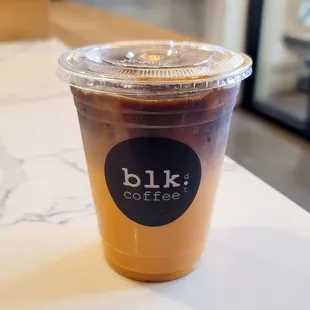 Iced Thai Pumpkin Spice - pumpkin spice Thai tea with a layer of black Vietnamese coffee on top