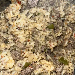 a mixture of rice and meat
