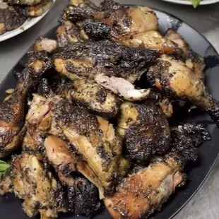 a plate of grilled chicken