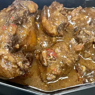 meat and gravy in a pan