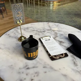 Great atmosphere and black coffee. Although not piping hot, cute mug and vibe.