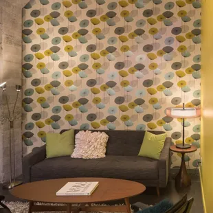 We have a gorgeous Green Room complete with shower, sink, vanity, couch and comfy chairs!