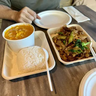 Chicken Yellow curry (L) and Beef Pad See Ew (R)