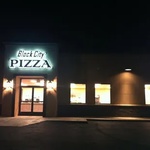 the front of the building at night