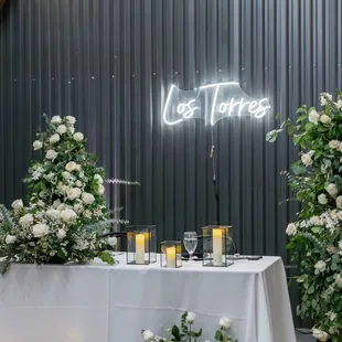 Beautiful sweetheart table, the blomgren staff was so accommodating and assisted with hanging the neon sign for us.