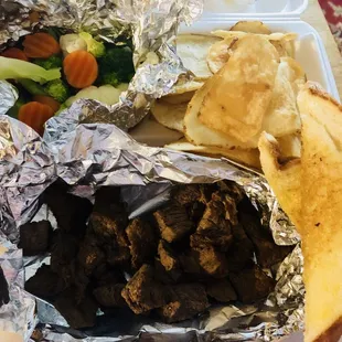 Plain steak tips, home made chips,  steamed veggies