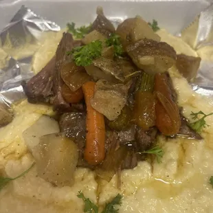 Southern Pot Roast over Four Cheese Grits