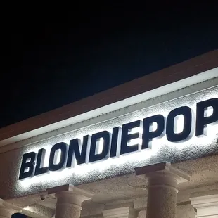 the front of a building at night