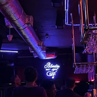people sitting at a bar