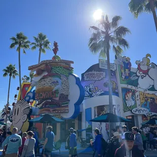 a crowd of people in front of a building