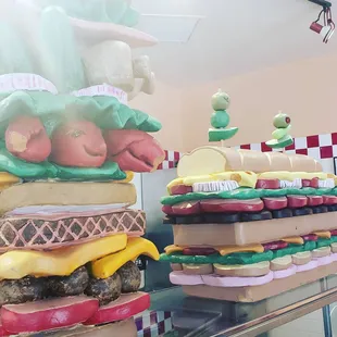 a giant hamburger and a giant sandwich