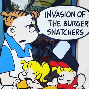 a cartoon of a burger snatcher