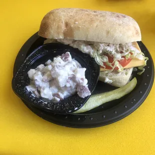 Tuna Salad Sandwich (w/ tomato and lettuce) with potato salad on the side