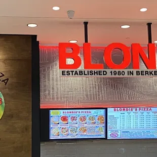 a large sign in a restaurant