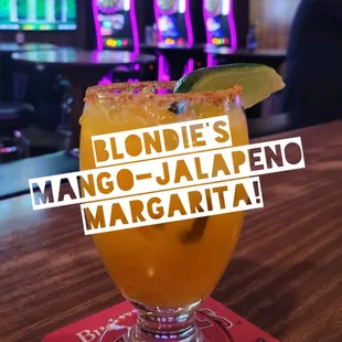 a margarita with a lime garnish