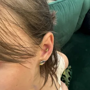 Plague doctor in conch piercing