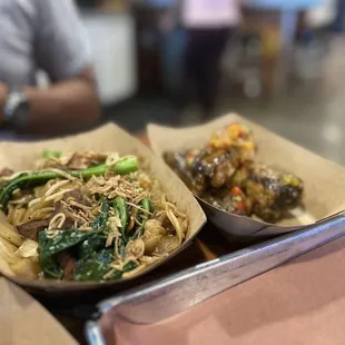 two baskets of food on a table