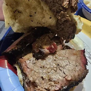 Sliced beef brisket sandwich